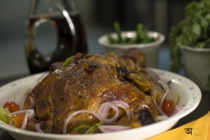 Masalaroasted Chicken with Shahi Gravy with clear texture of the Chicken skin can be seen