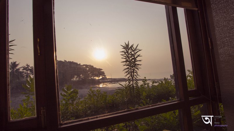 Resort room window view of Sunrise from Ganga Kutir 
