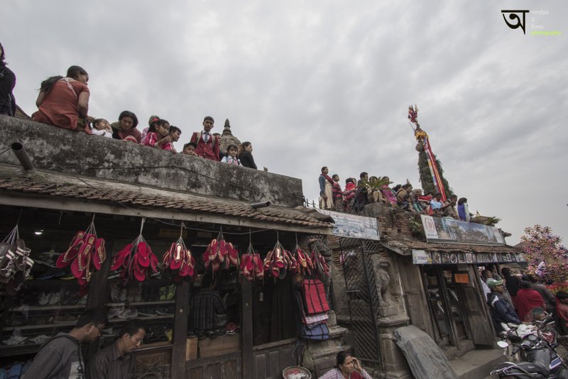 Onlookers at roof terrace watching Rato Machhendranath festival in Kathmandu Nepal . Pictures by pikturenama