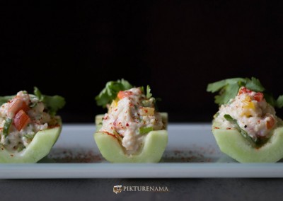 Cold crab salad in cucumber boats is ready to eat by pikturenama