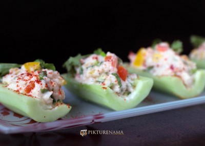 Cold crab salad in cucumber boats once ready by pikturenama