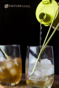 Iced tea with lemongrass and ginger on the rocks by pikturenama