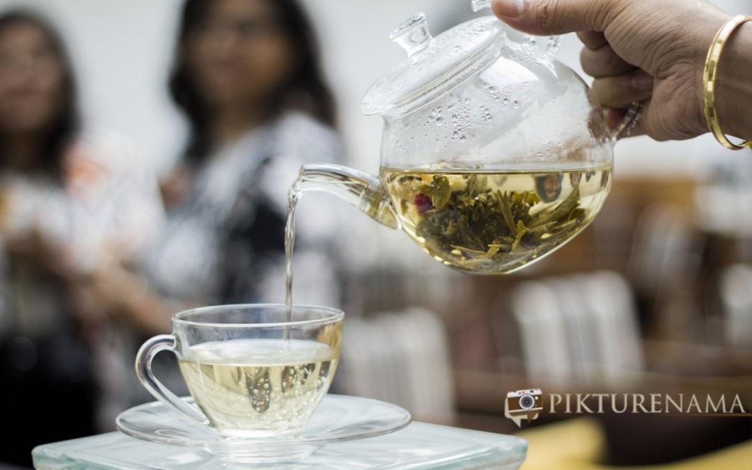 Pikturenama at The Lalit Great Eastern Kolkata Tea Lounge the blooming tea