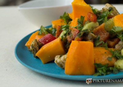 Close up of Mango Chicken salad with zesty coriander and chili dressing